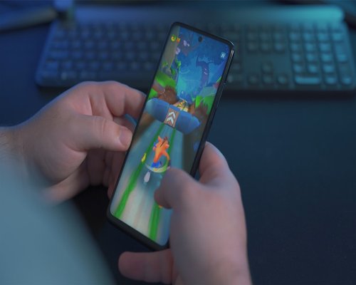 Smartphone displaying the fictional Coral Puzzle Passage exploration game